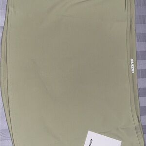 sage green Danielle Guizio mini skirt